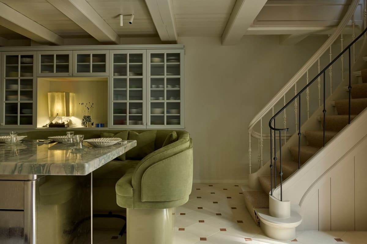 This Kitchen's Sage Green 'Island Sofa' Is the Idea That Finally Makes In-Kitchen Dining as Comfortable as It Should Be