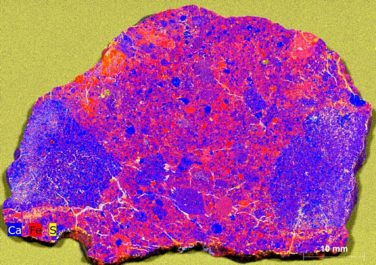 Lunar Meteorite Preserves Evidence of Colossal Asteroid Strike