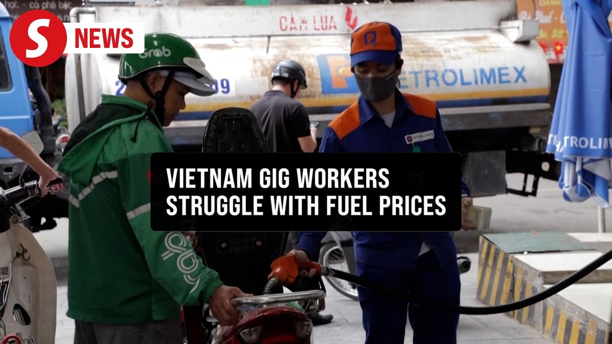 Vietnam Delivery Riders Squeezed as Fuel Costs Rise on Middle East Tensions
