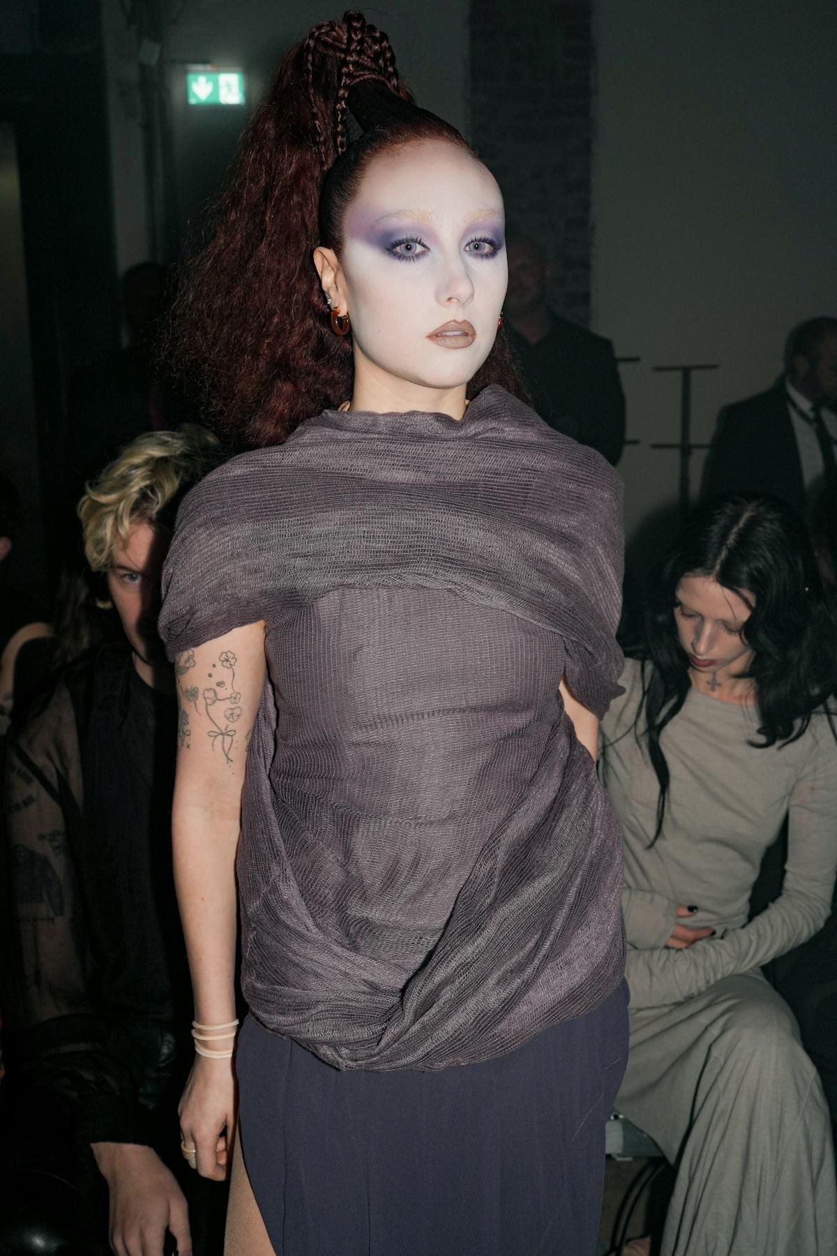 Chappell Roan Takes the Paris Front Row in a Gothic Cut-Out Dress