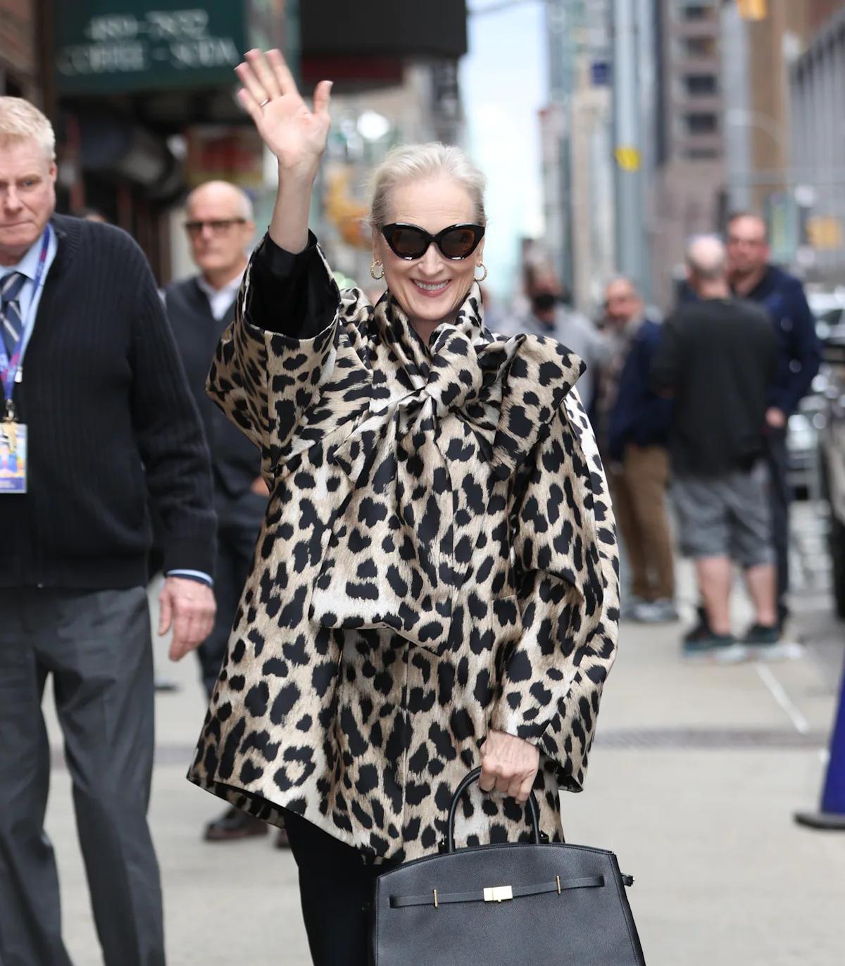 Meryl Streep Hides a Cerulean Sweater Under Her Leopard Top Coat