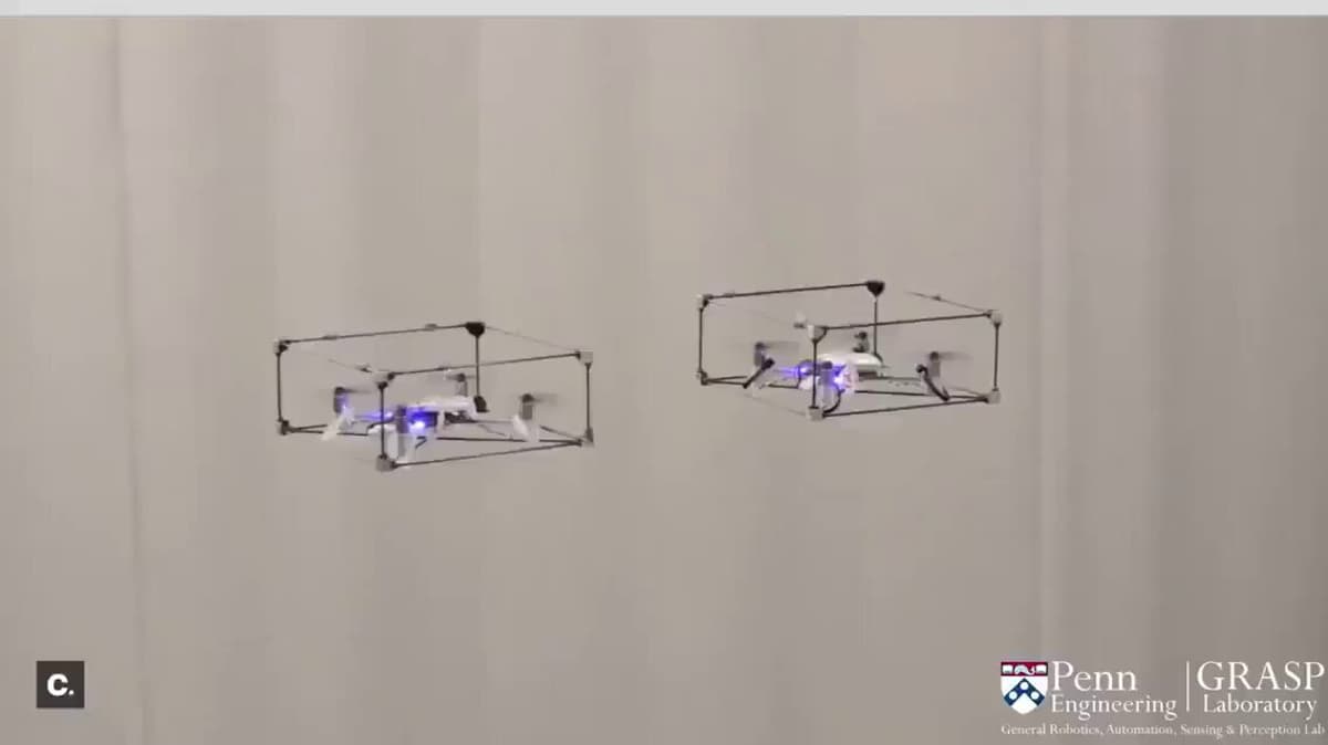 Modular Quadrotors Dock Mid‑Air to Form Cooperative Robot