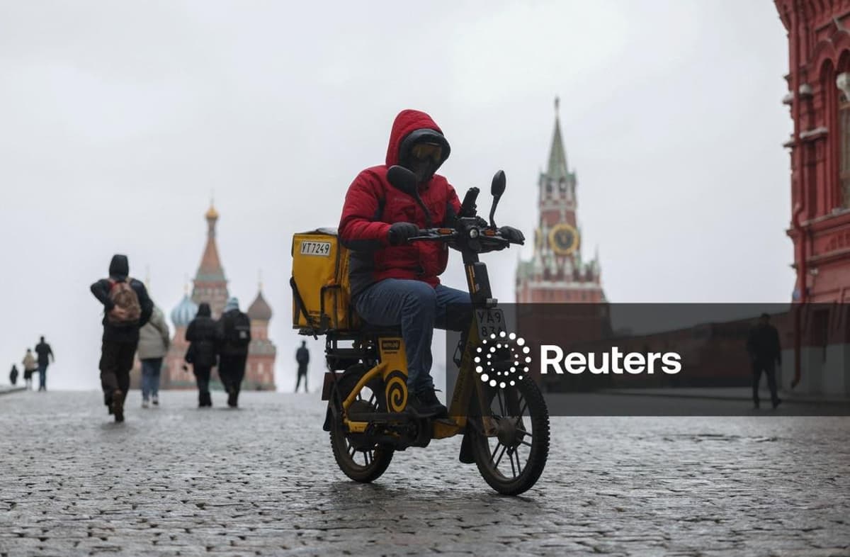 Electric E‑bike Courier Zips Through Moscow’s Red Square