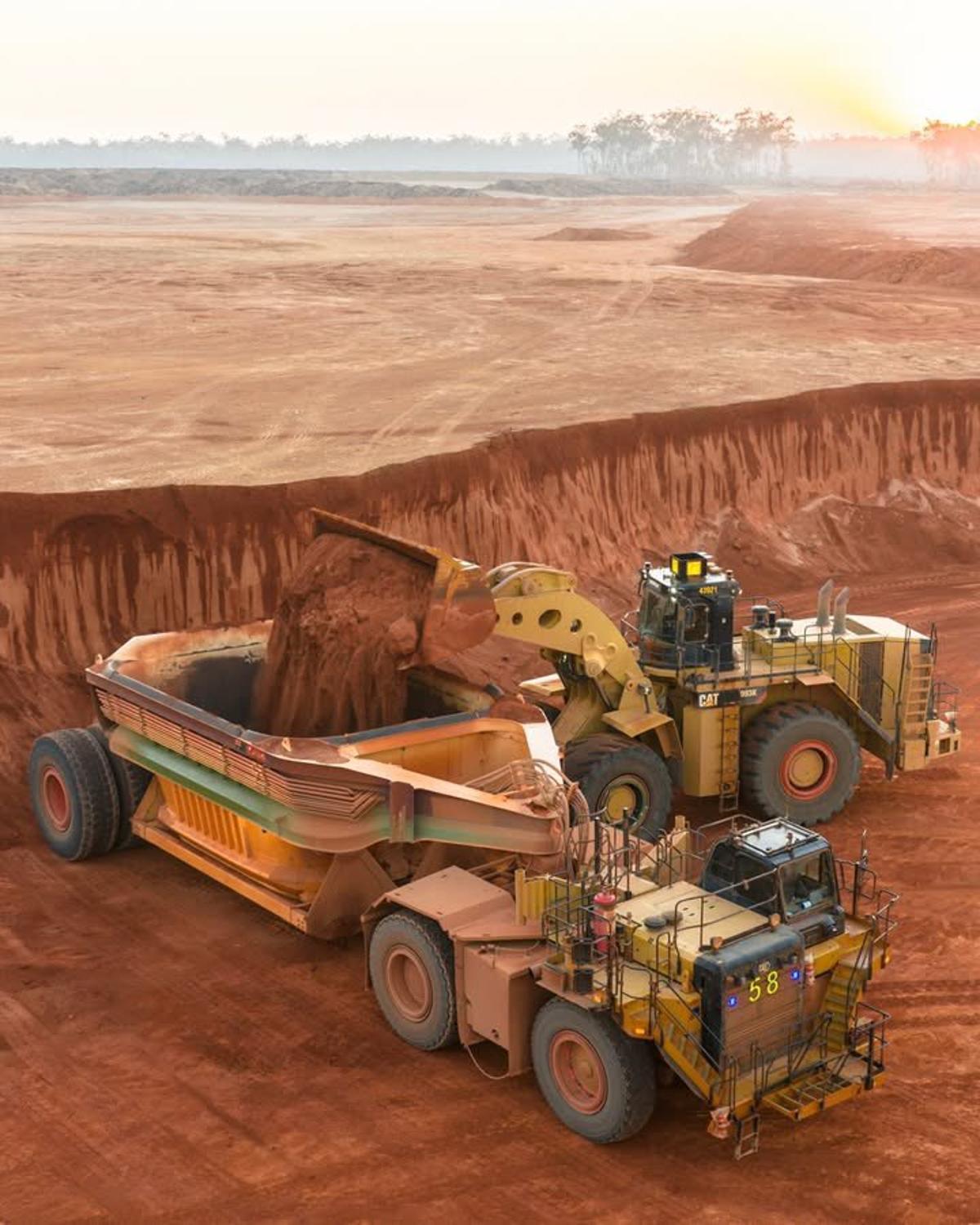 Custom Dump Trucks Double Capacity for Shallow Bauxite Mines