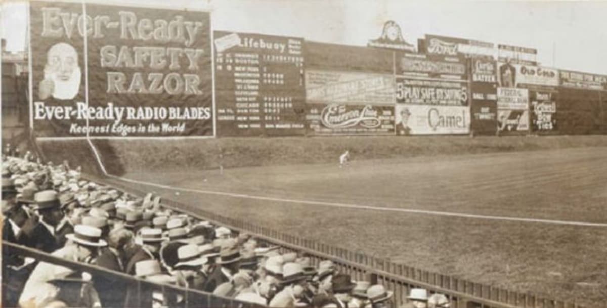 Stadium Ads Return Sparks Debate Among Baseball Purists