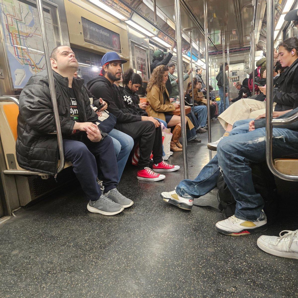Subway Commuters Abandon Books for Phones, Ads Go Floor
