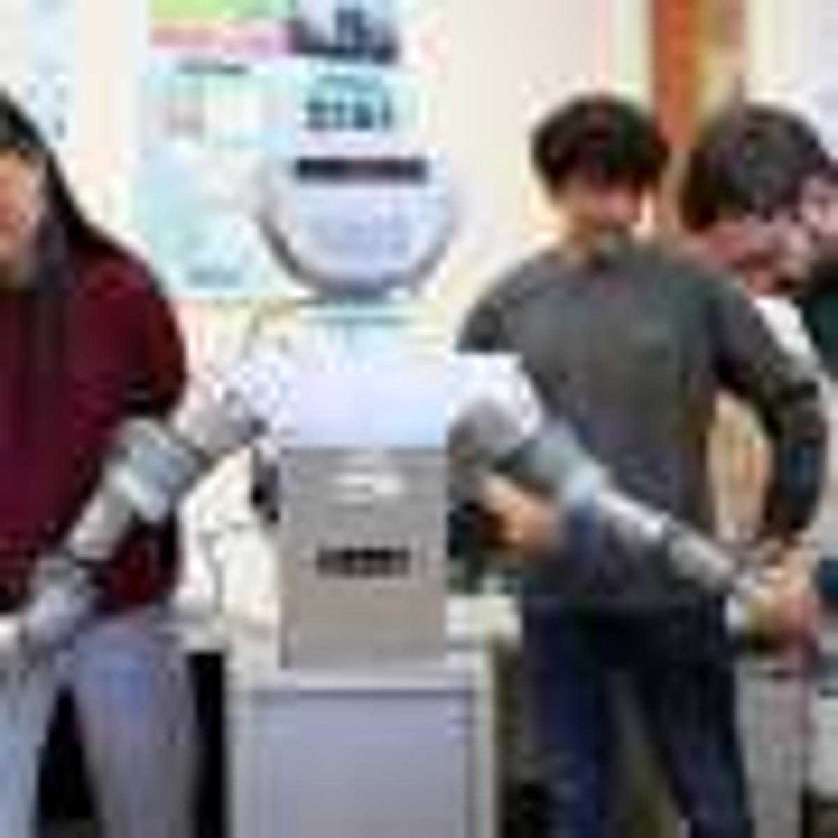 An Assistive Robot Learns to Set and Clear the Table by Observing Humans