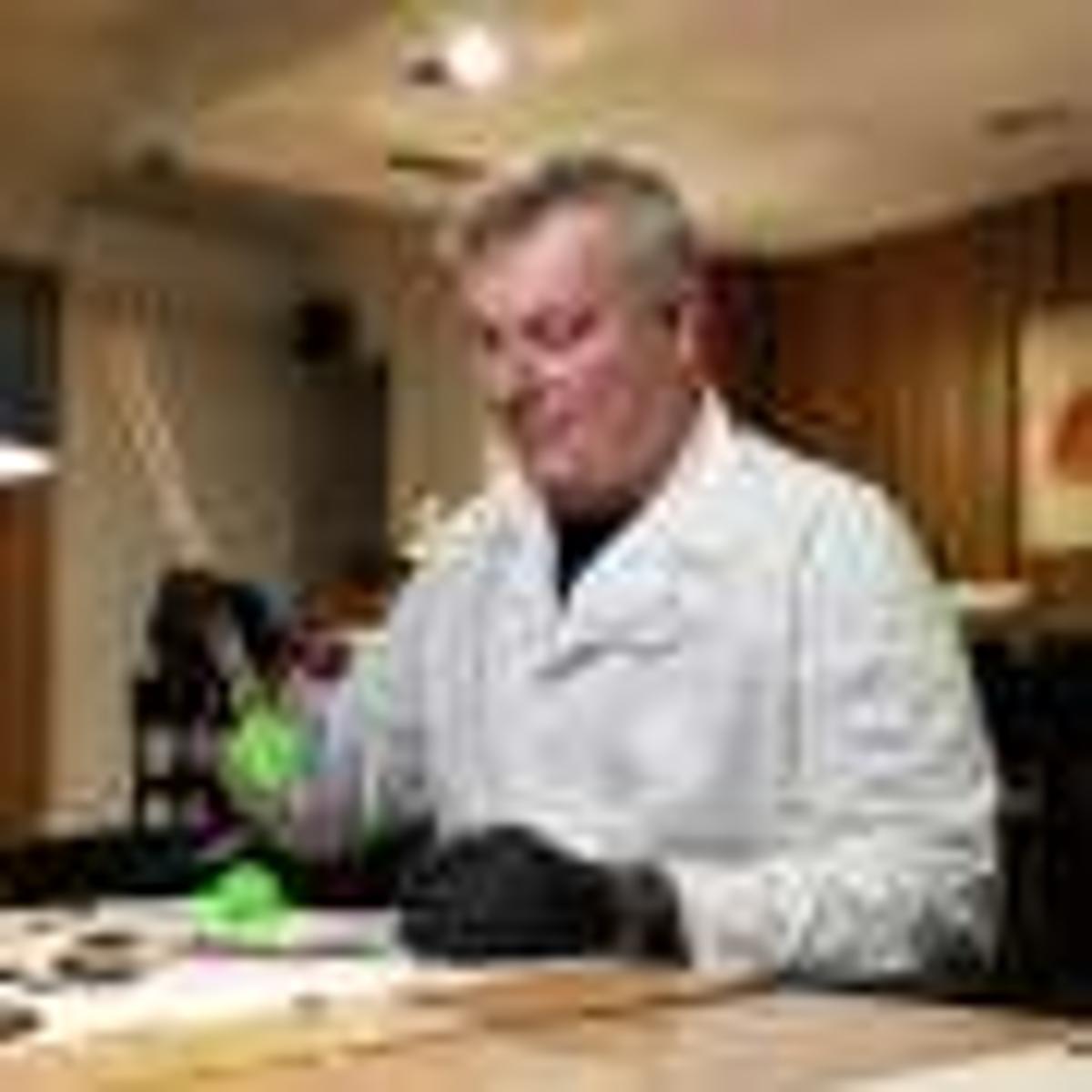 Shaping Carbon Fiber with Electricity: Wireless Voltage Pulses Drive Reversible Bending