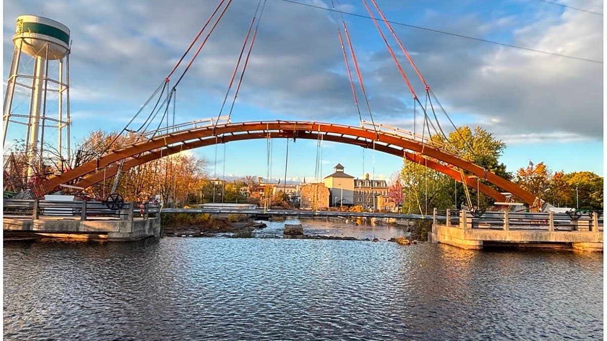 Ontario’s First Modern Timber Bridge Arcs 52 Metres Over the Rideau