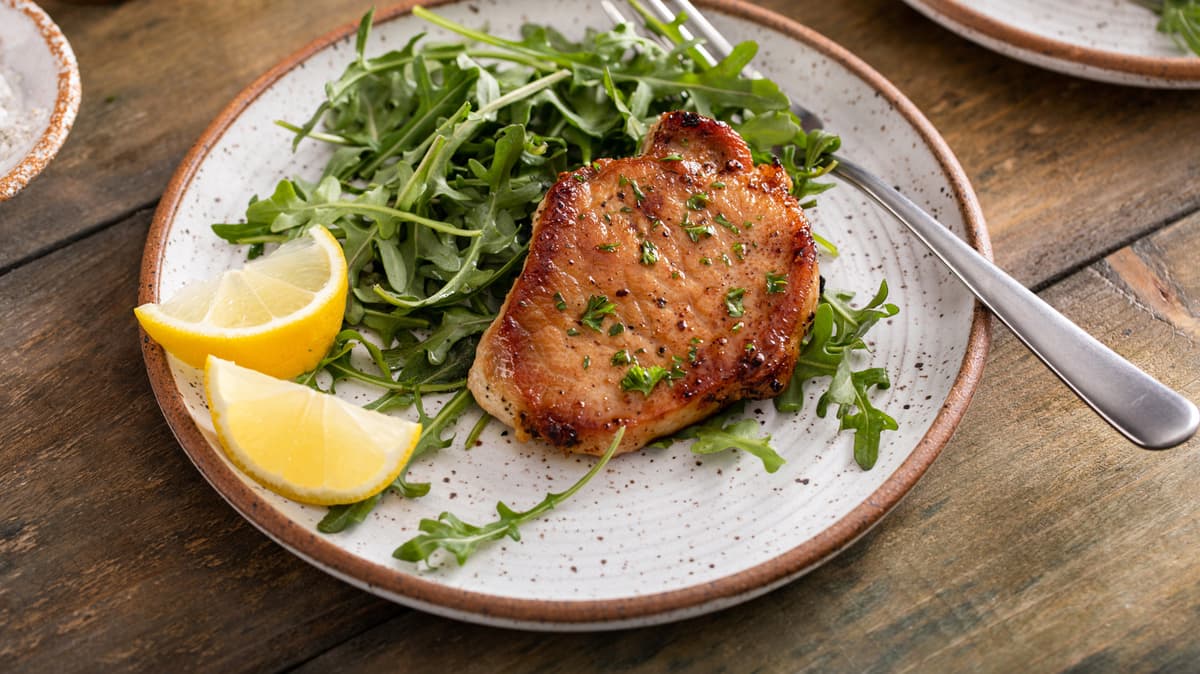 The Best Way To Cook Pork Chops Isn't In A Pan Or The Oven