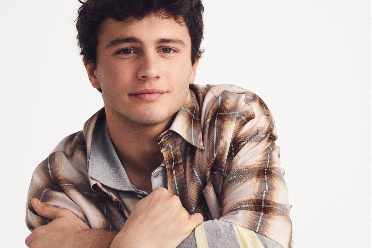 PSG Star João Neves Plays the Tuba for the Ami Paris Spring Collection