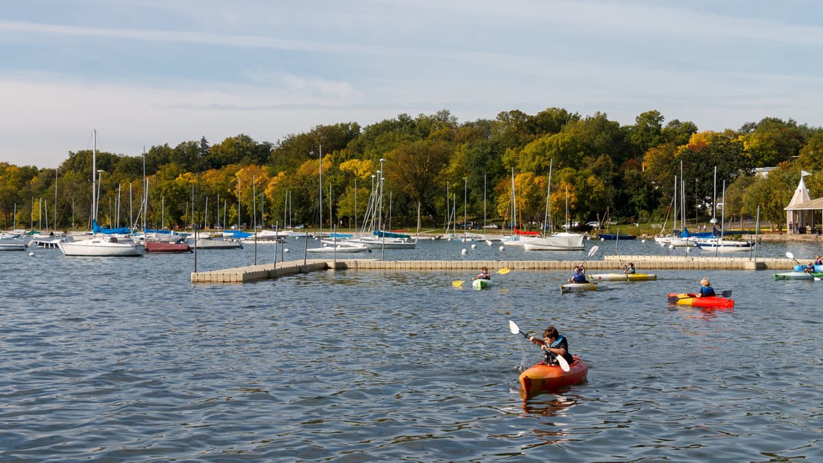 Minnesota's Lake Park Minutes From Downtown Minneapolis Has Sandy Swim Beaches, Trails, And Fishing