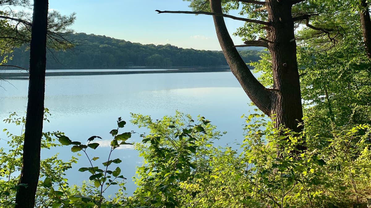 Nestled Between Albany And New Haven Is Connecticut's Deepest Natural Lake With Crystal-Clear Water For Fishing