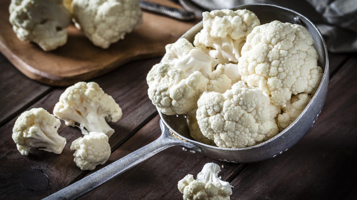 You've Heard Of 'Melting' Cabbage And Potatoes — Now It's Time To Try It With Cauliflower