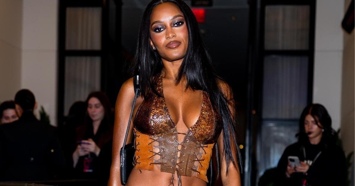 Ciara Miller Shows Off More Than Just Curves in Lace-Up Plunging Top