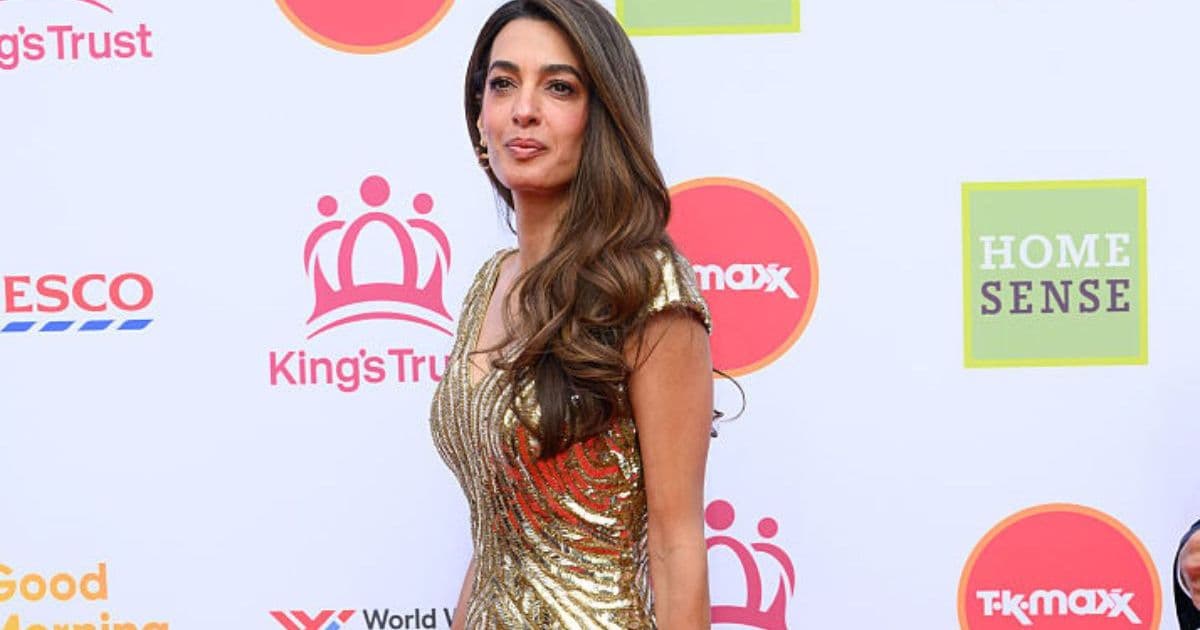 Amal Clooney Is a Golden Goddess in Archival Body-Hugging McQueen Gown