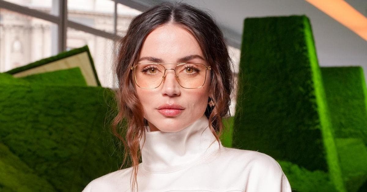 Ana De Armas Shows Some Skin in Plunging Leather Dress for Louis Vuitton