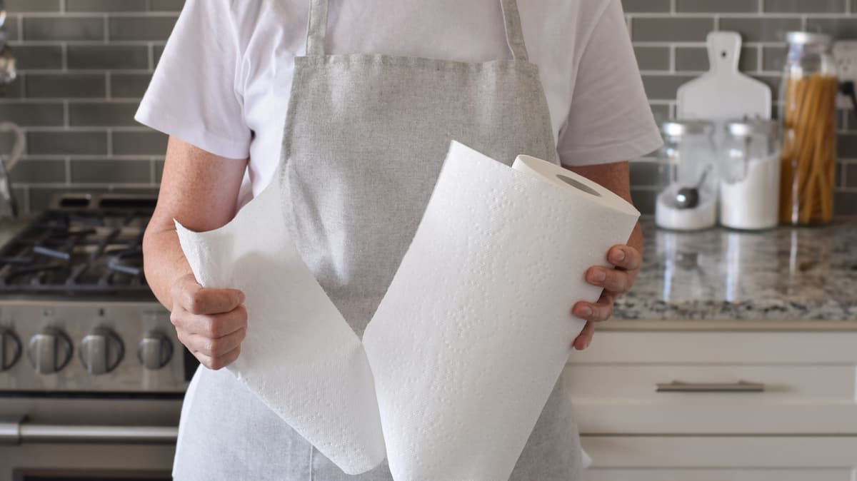 The Easiest DIY Paper Towel Holder Is Sitting In Your Closet Right Now