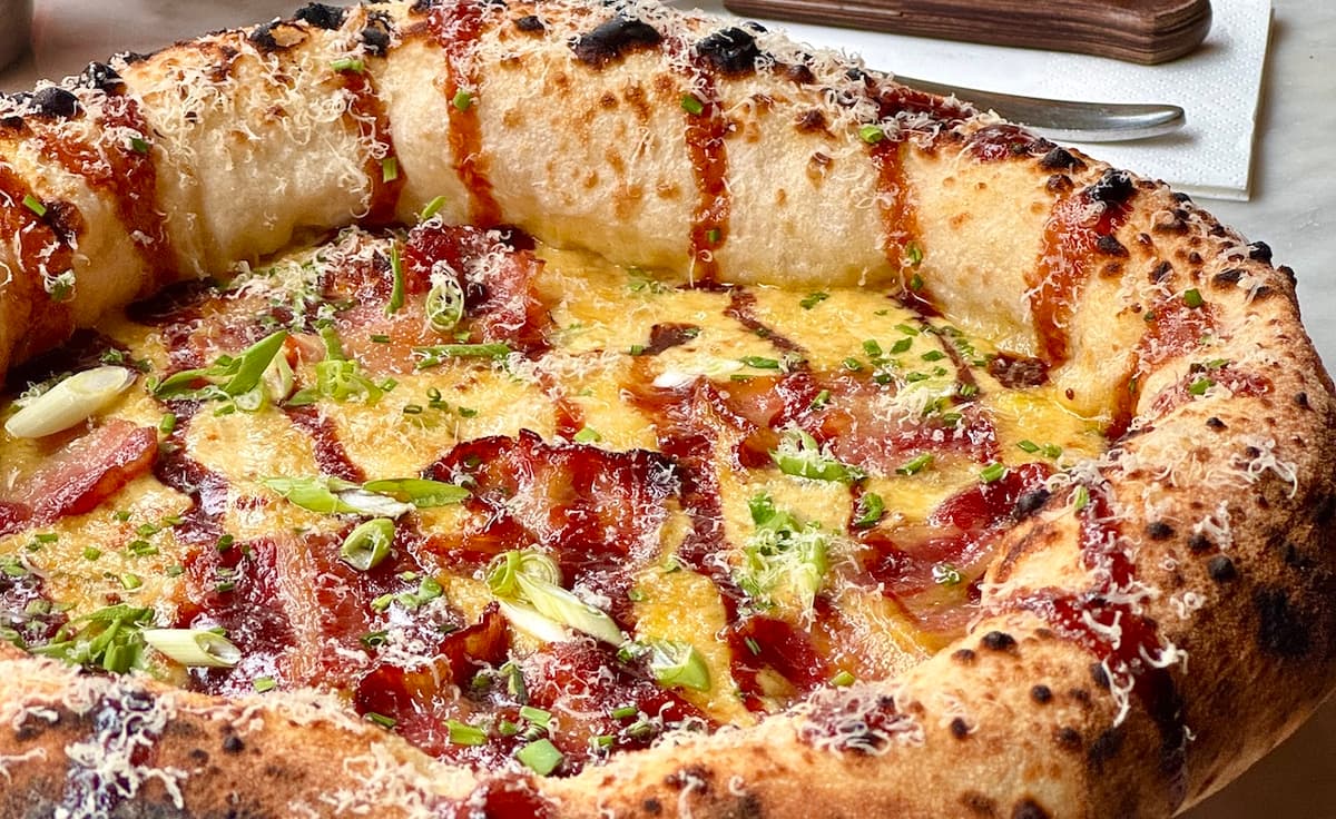 Crust Bros and Daffodil Mulligan Unveil Limited-Edition Guinness Rarebit Pizza for April